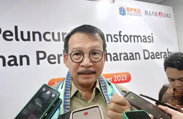 Kepala Badan Pengelolaan Keuangan Daerah (BPKD) DKI Jakarta Michael Rolandi C. Brata usai meresmikan peluncuran aplikasi siMerak di Balai Kota DKI, Jakarta Pusat, Senin (16/10/2023)